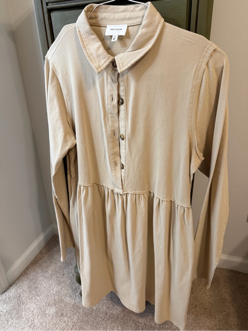 Cream tunic.